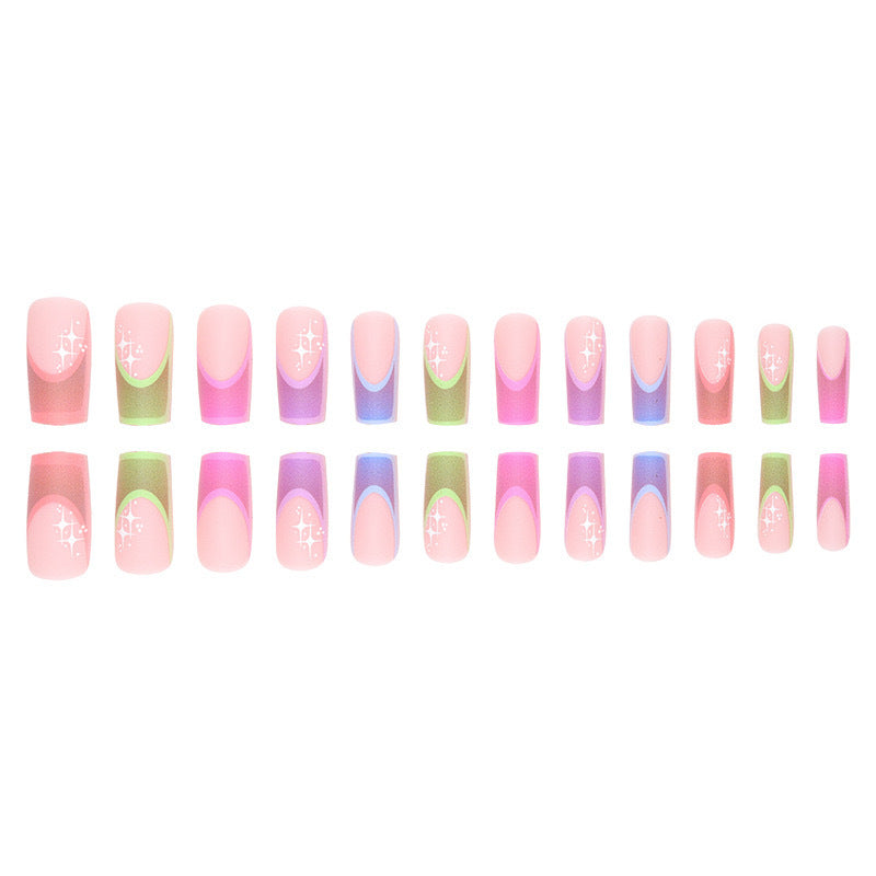 Acrylic nail set with colorful geometric designs and glitter accents Bowlift