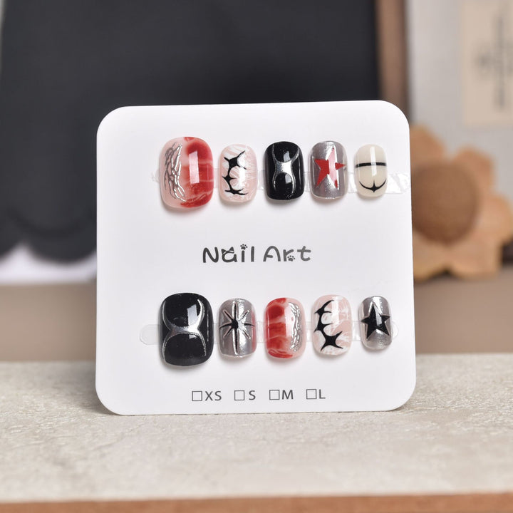 Decorative Press-On Nail Extensions with Floral Accents Bowlift