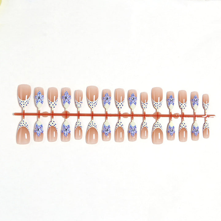Artificial nails with delicate butterfly designs Bowlift