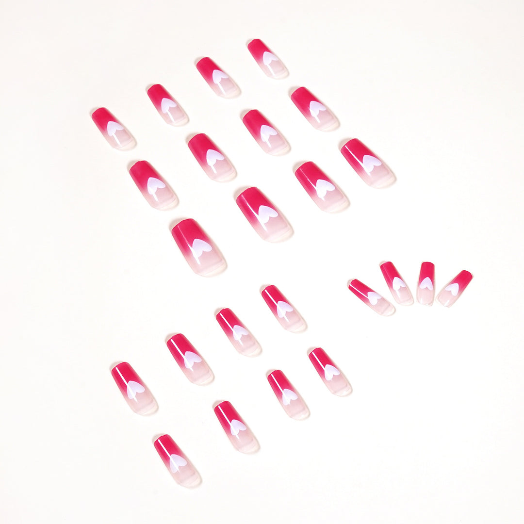 Artful nail extensions in romantic heart design Bowlift