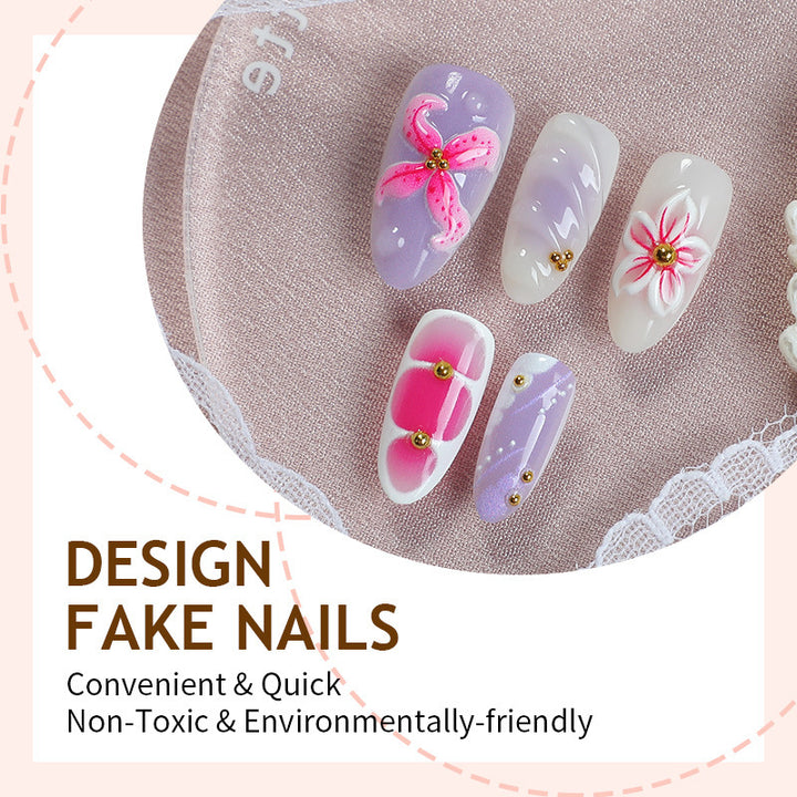 Artificial nail set with floral decorations and delicate glitter Bowlift