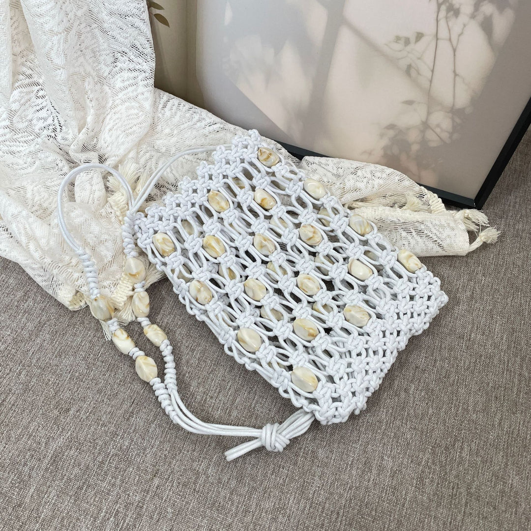 Hand-knotted shoulder bag with shells Bowlift
