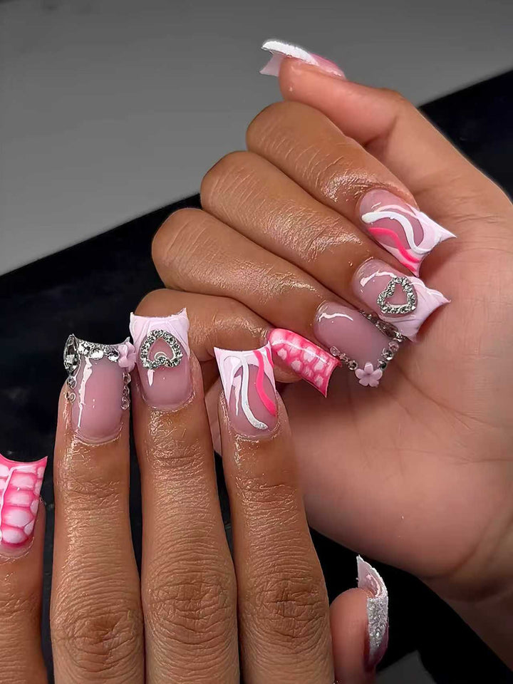Artistic Heart-Embellished Nail Extensions Bowlift