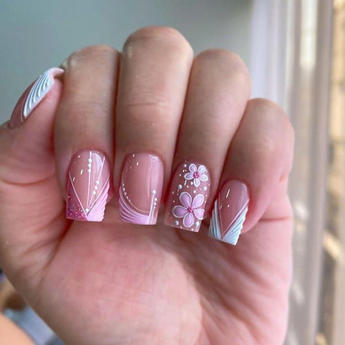 Artful Nail Art with Floral Decorations Bowlift