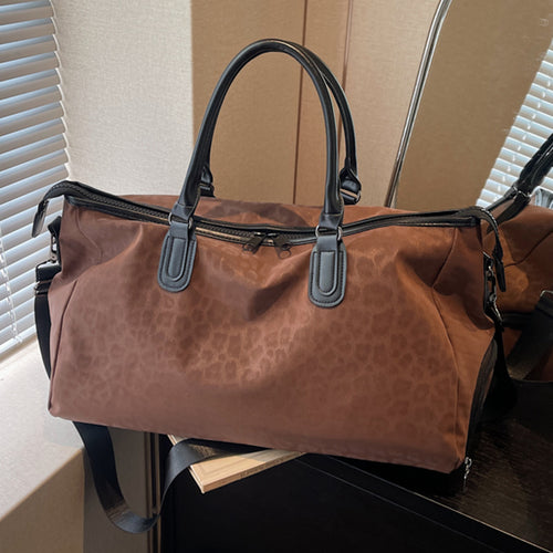 Elegant Travel Bag with Innovative Leopard Print Bowlift