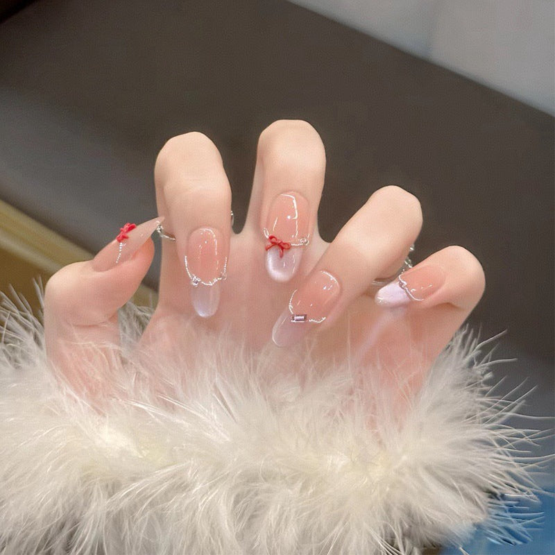 Artistic Nail Design with Decorative Elements Bowlift