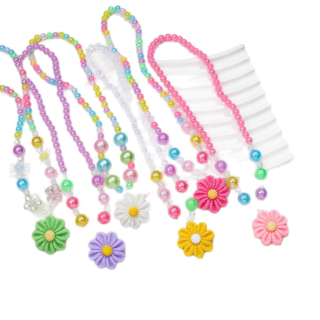Playful jewelry set with flower pendant Bowlift
