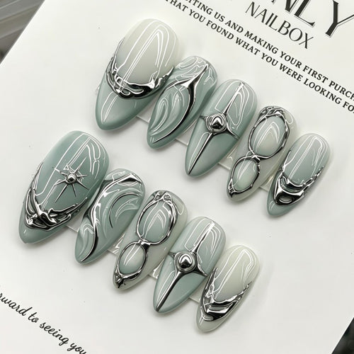 Elegant Artificial Nails with Artistic Accents Bowlift