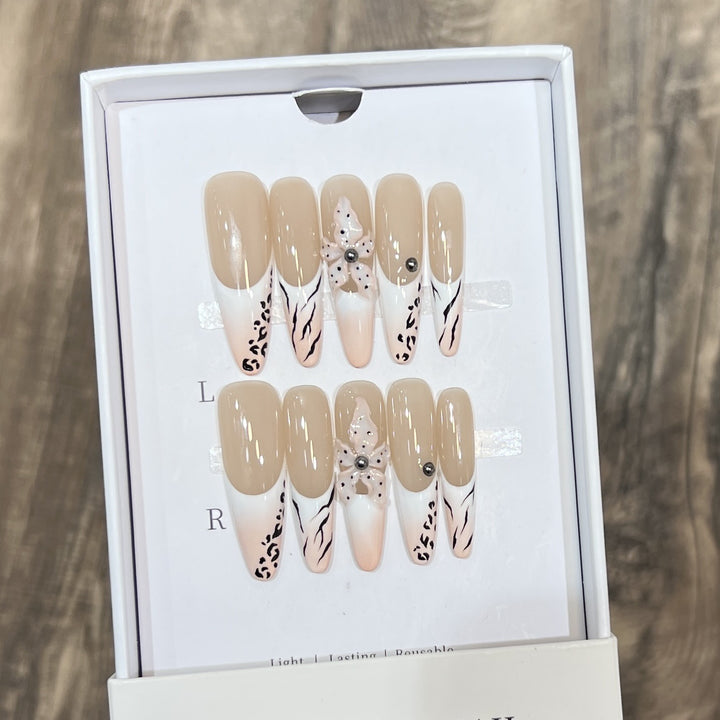 Elegant Stiletto Press-On Nail Set with Decorative Accents Bowlift