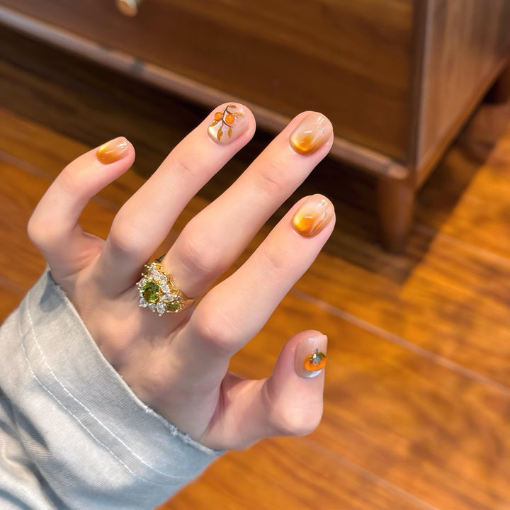 Artificial nails in elegant ombre look with floral accent Bowlift