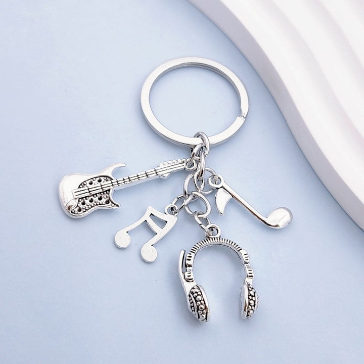 Keychain with musical instruments motifs Bowlift