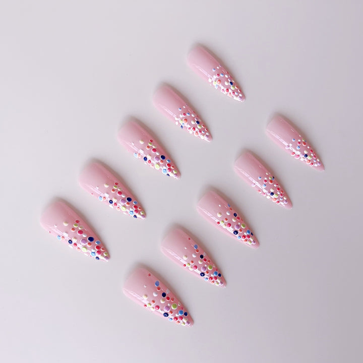 Acrylic nail set with colorful glitter dots and elegant tips Bowlift