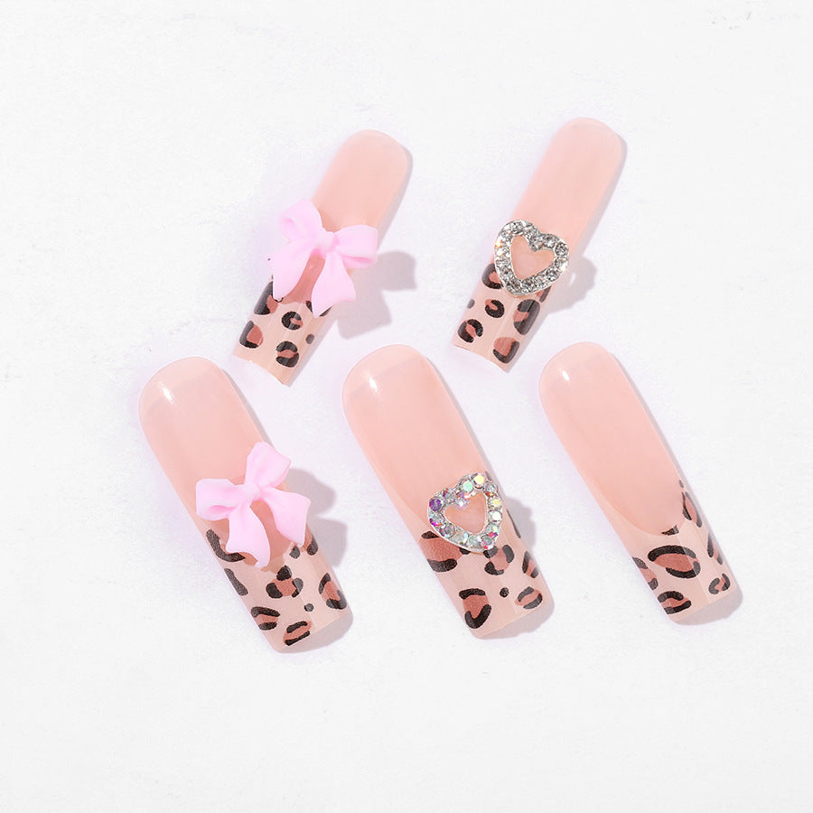 Artistic Press-On Nail Kit with Charming Leopard and Bow Designs Bowlift