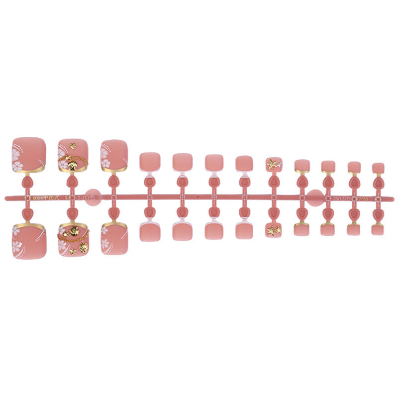 Artificial nail set with elegant, floral accents and golden decorations Bowlift