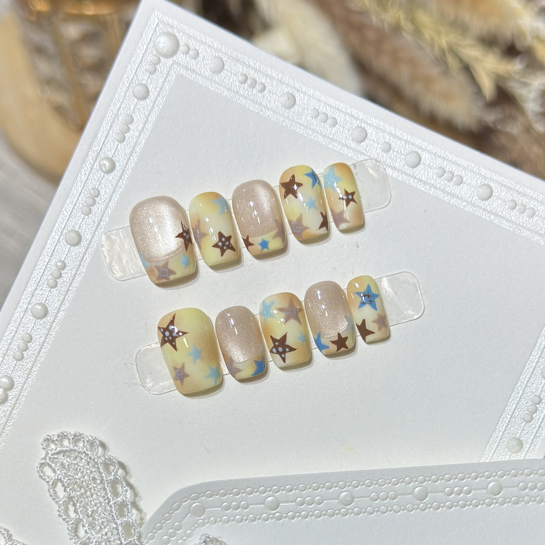 Press-On Nail Art Set with Star Accents Bowlift