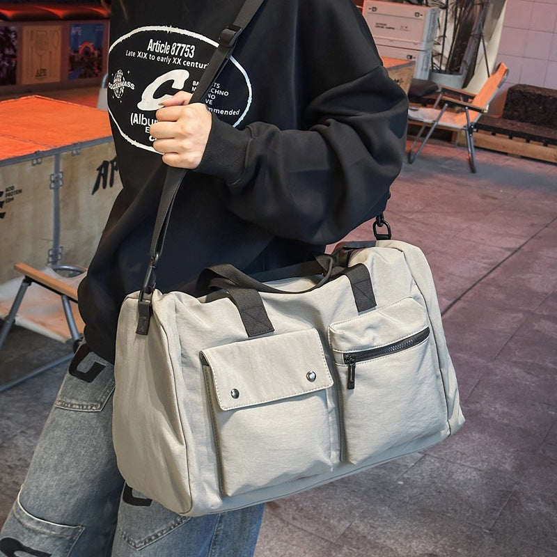Versatile sports and travel bag with practical outer pockets Bowlift