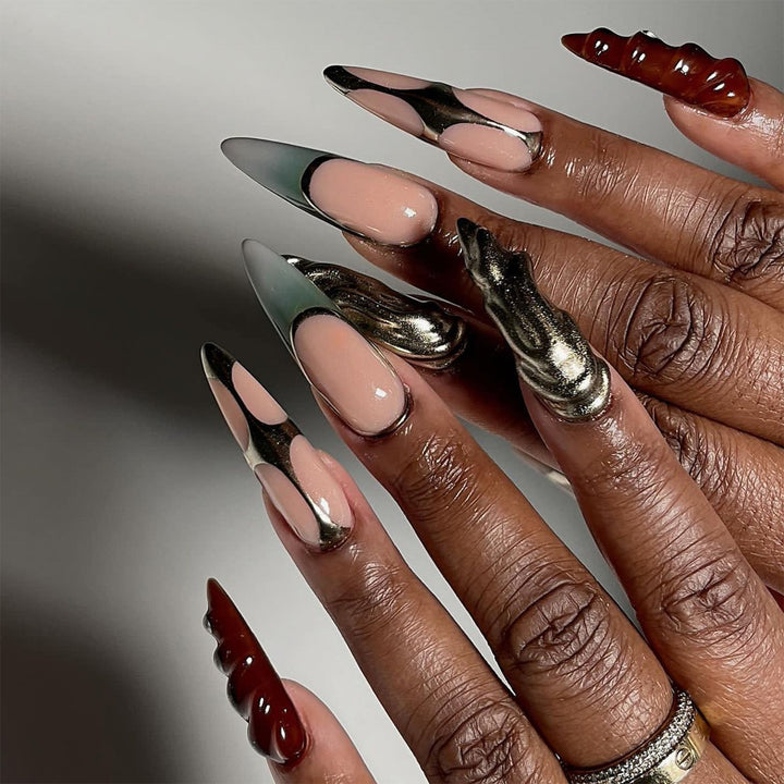 Artistic Stiletto Nails with Glitter and Metallic Effects Bowlift