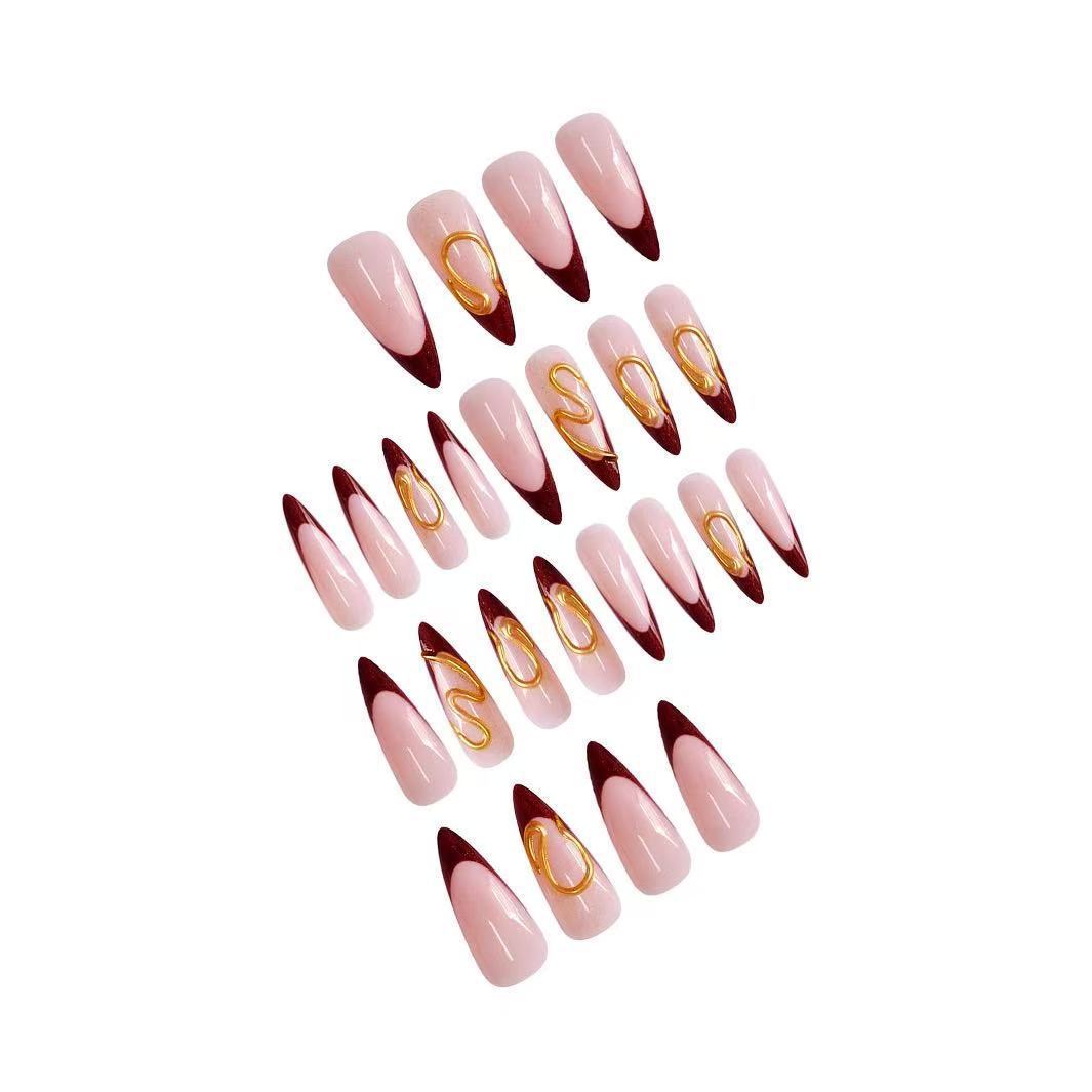 Artistic Stiletto Nail Extensions with Abstract Design Bowlift