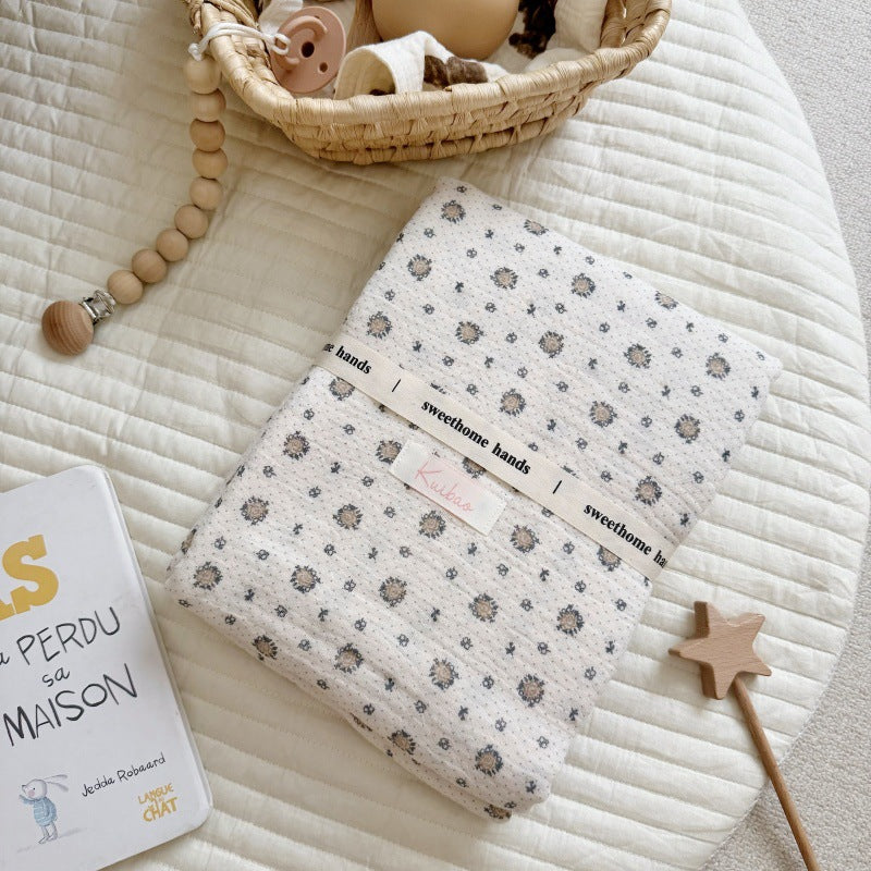 Unisex Muslin Blanket with delicate floral design and elegant ruffles Bowlift