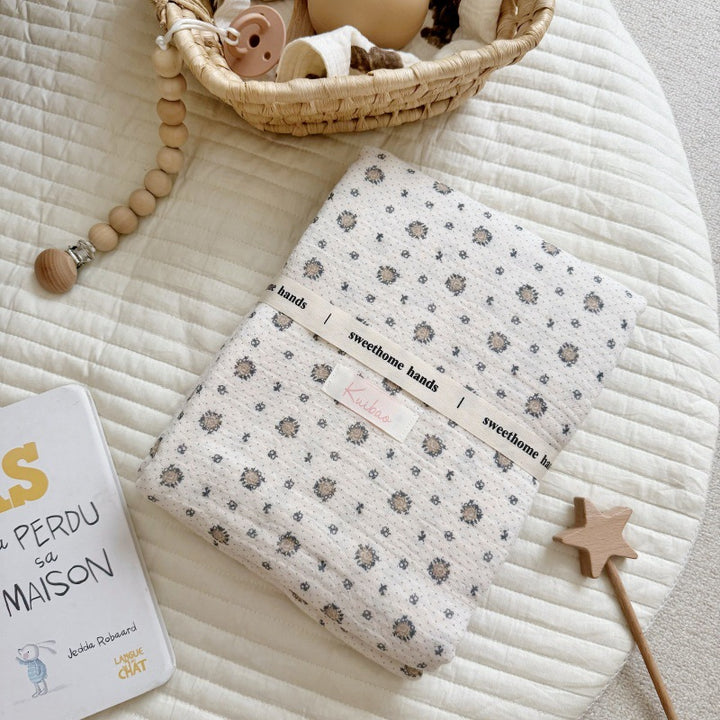 Unisex Muslin Blanket with delicate floral design and elegant ruffles Bowlift