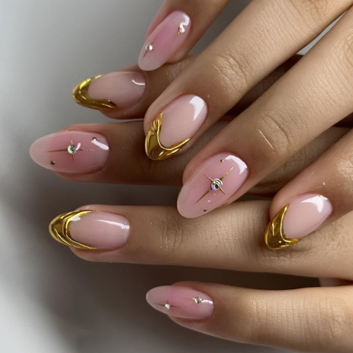 Artistic Nail Extensions with Glamorous Gold Finish Bowlift