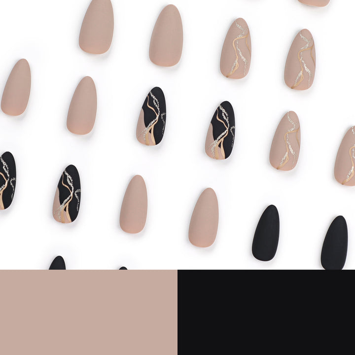 Artful nail designs with elegant gold accent Bowlift