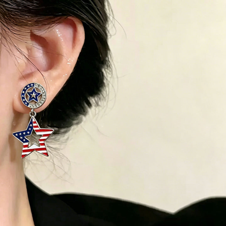Ladies hanging earrings with star pendant and enamel flag motif Bowlift