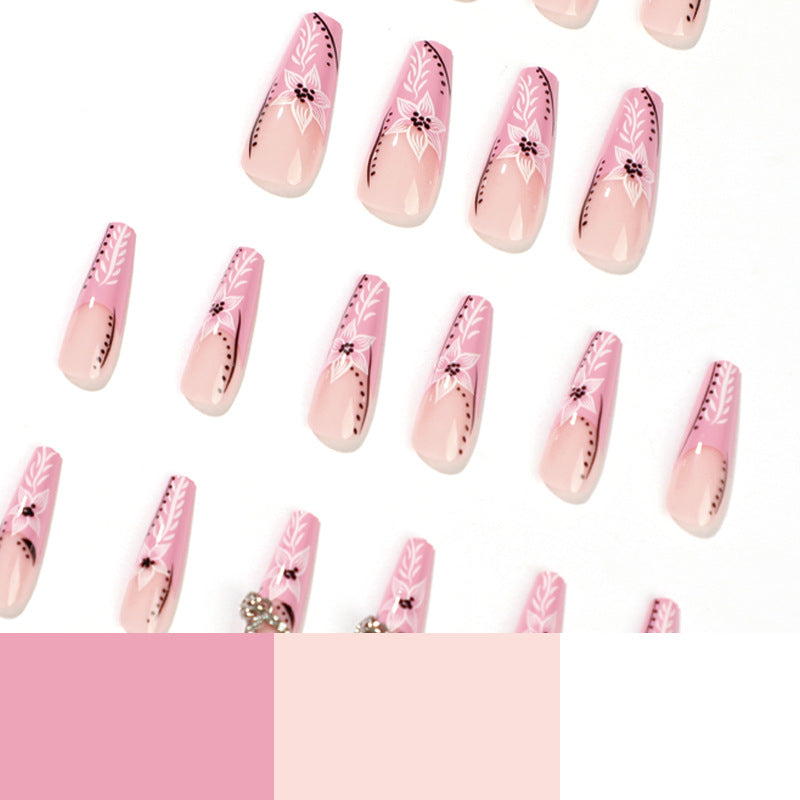 Artistic nail art with flower and heart motifs Bowlift