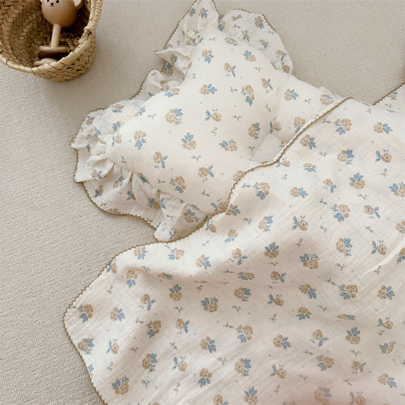 Unisex Muslin Blanket with delicate floral design and elegant ruffles Bowlift