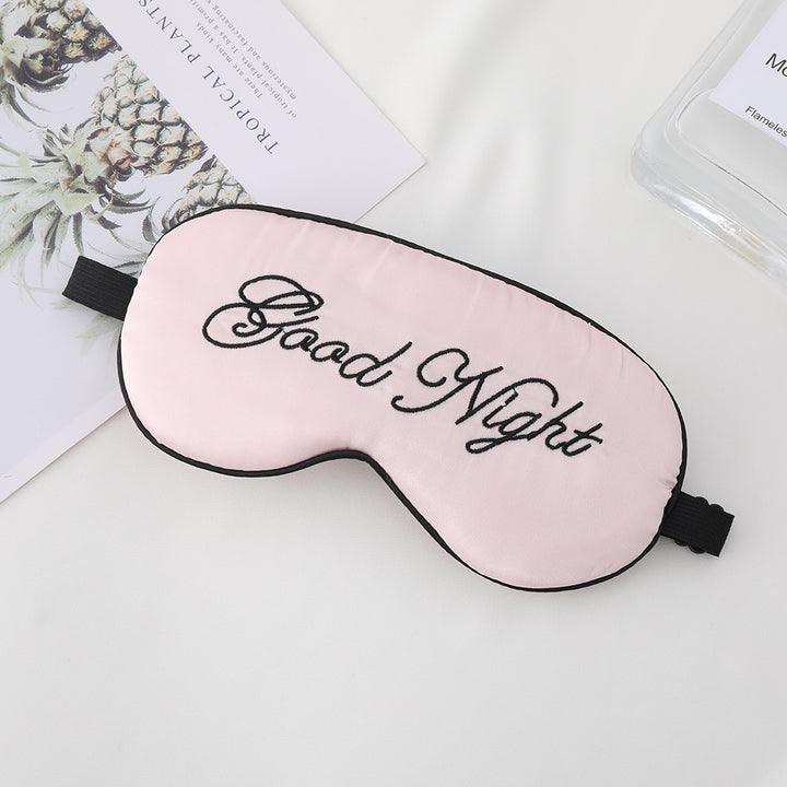 Unisex embroidered contoured sleep mask with decorative text embroidery and adjustable elastic band Bowlift