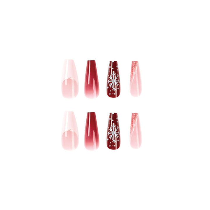 Artful Christmas nail extensions with elegant glitter and snowflake design Bowlift