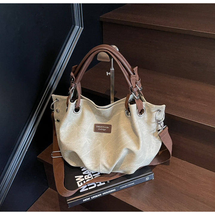 Everyday handbag with innovative carrying system Bowlift