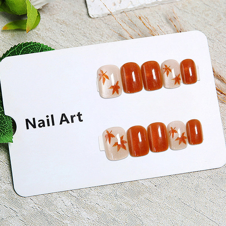Elegant nail set with autumn leaves Bowlift