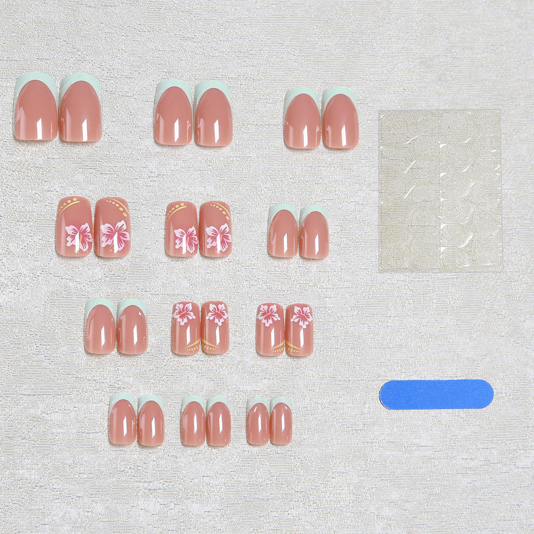 Artificial nail set with floral motifs and shiny accents Bowlift