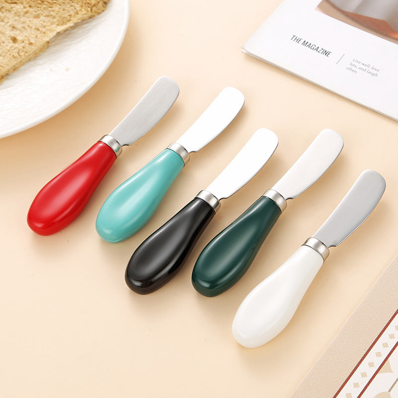 Elegant spreader knife with ergonomic handle Bowlift