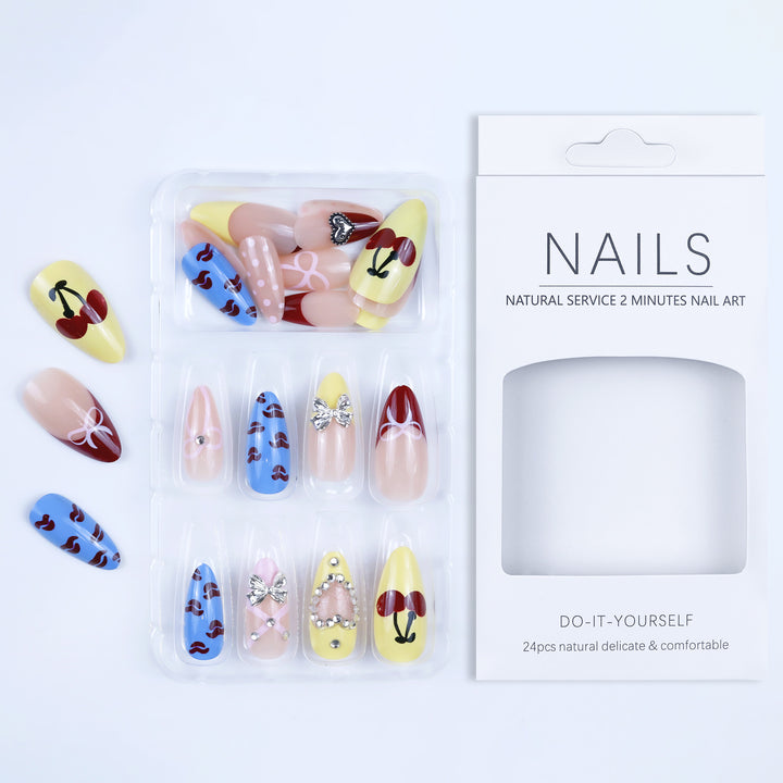 Artificial nails with playful design and 3D embellishments Bowlift