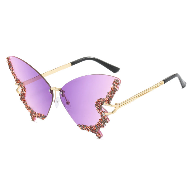 Ladies extravagant Cats Eye sunglasses with sparkling accents Bowlift