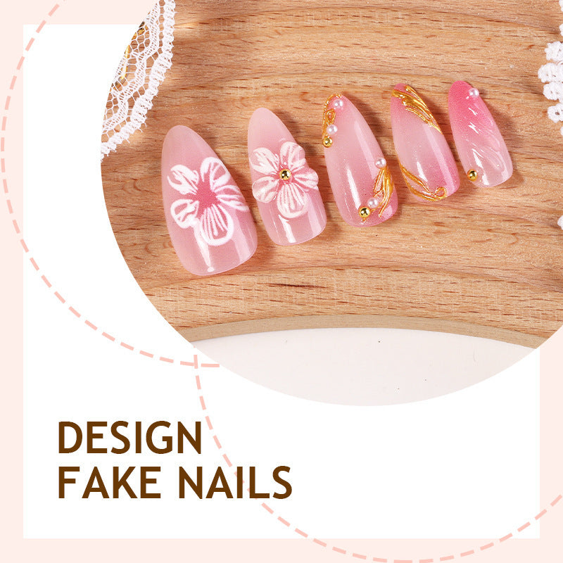 Creative nail art set with floral and golden accents Bowlift