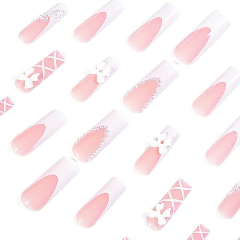 Artificial nail set with elegant 3D bows and pearl embellishments Bowlift