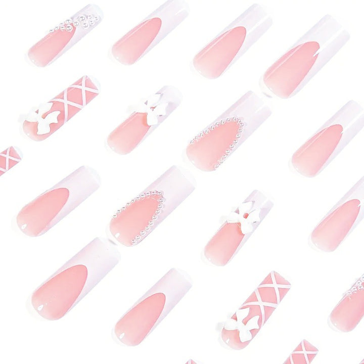 Artificial nail set with elegant 3D bows and pearl embellishments Bowlift