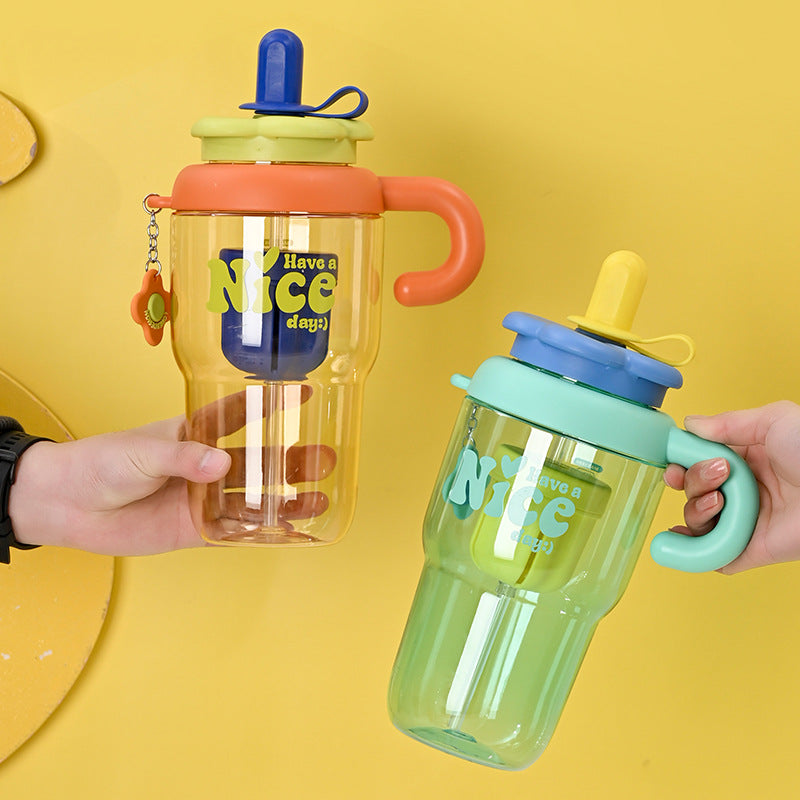 Unisex drinking cup with integrated straw and spill protection Bowlift