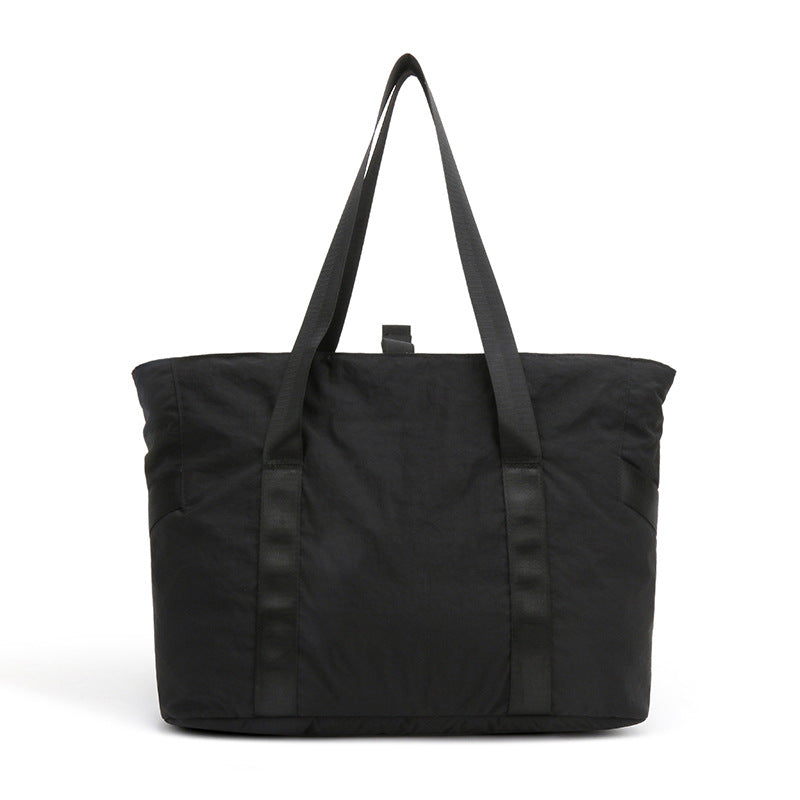 Stylish tote bag with spacious main compartment and reinforced handles Bowlift