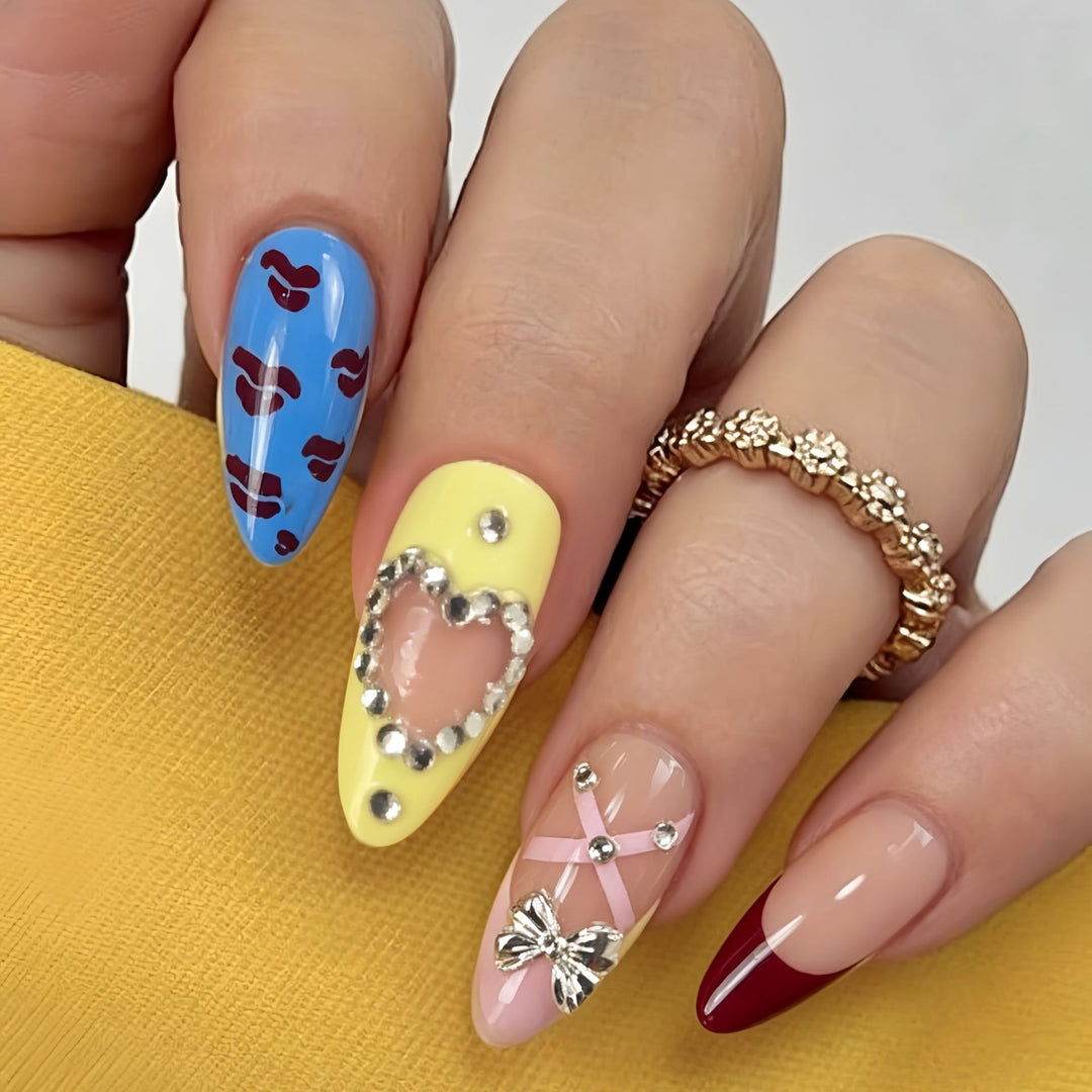 Artificial nails with playful design and 3D embellishments Bowlift