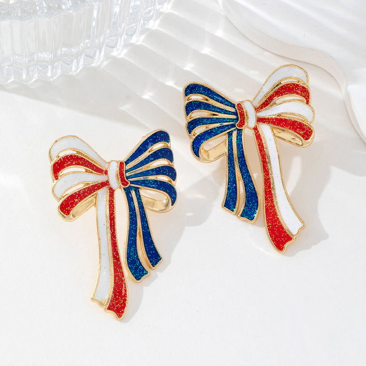 Ladies' elegant enamel bow earrings with glitter effect and gilded setting Bowlift