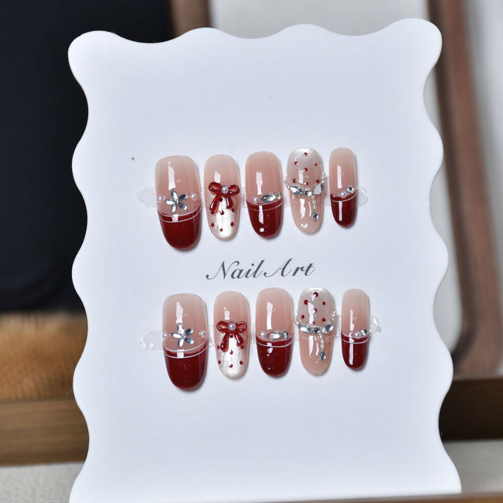 Artistic Press-On Nail Extensions with Gem Accents Bowlift