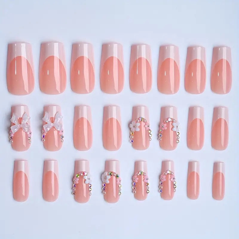 Artificial nails with elegant 3D bows and glitter accents Bowlift