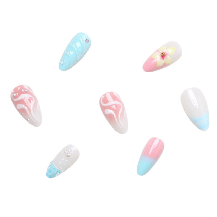 Artificial nail set with floral and shell-shaped designs Bowlift