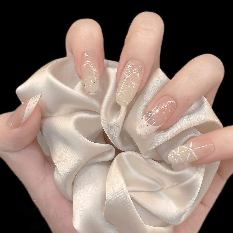 Elegant Press-On Nail Set with Artistic Detailing Bowlift