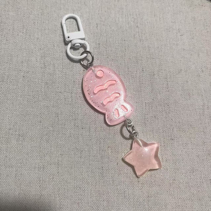 Playful keychain with fish and star motif Bowlift