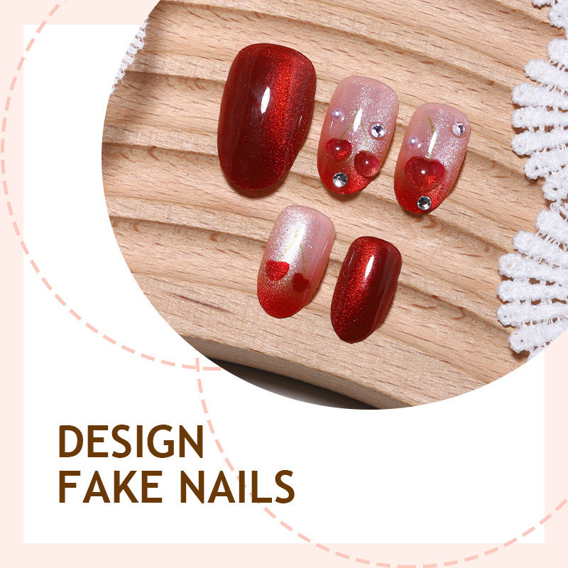 Artificial nail set with glamorous accents and creative heart motifs Bowlift